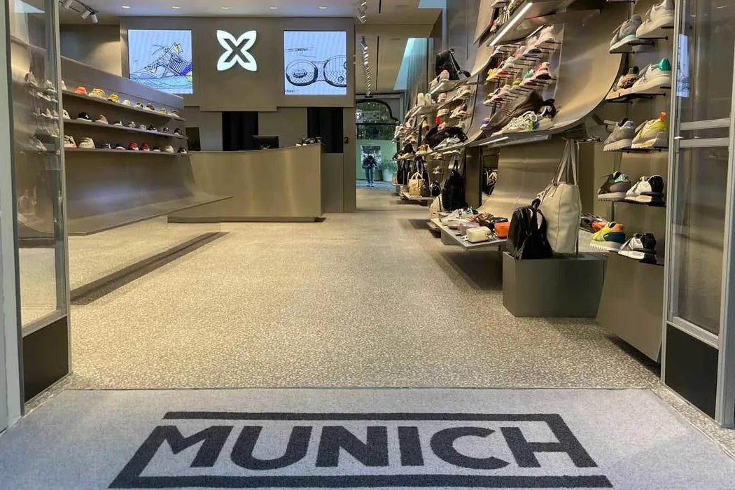 Munich valuta chiusura di 15 punti vendita in Spagna per ridurre costi